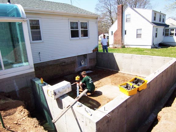 Crawl space foundation poured for bedroom addition