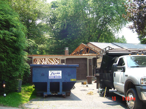 Removal of roof before second story addition