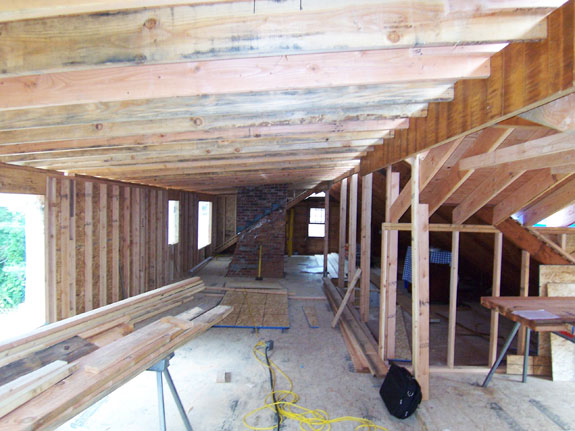 Rear dormer is framed to create second story