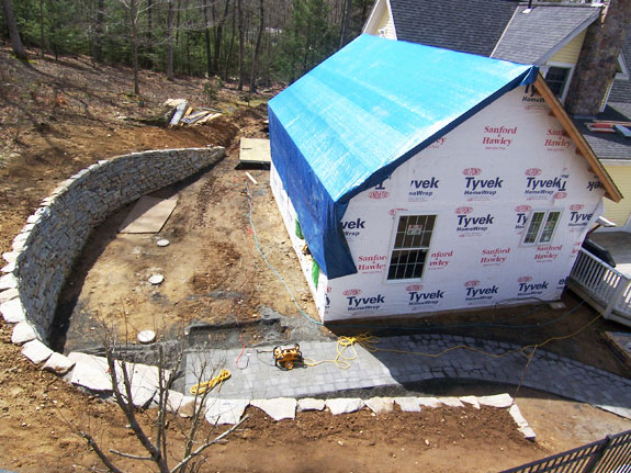 Sunroom on Concrete Piers Started after retaining wall was built.