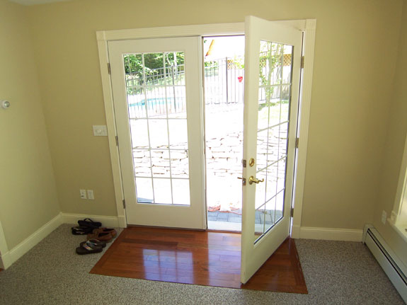 French doors with Hardwood Floor Inlay