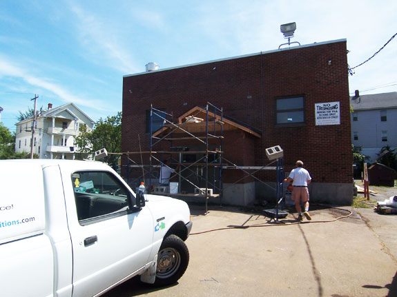 Our masons working on the building