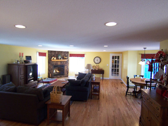 Finished living room with gas fireplace