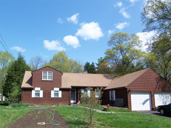 Completed front dormer on single level ranch