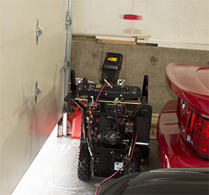 tight fit between snowblower car garage